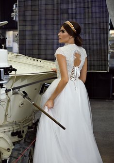 Cвадебная прическа Классический гладкий низкий пучок (Т21443) с собранными волосами